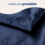 Crafted with precision. 2 Navy Blue Bosley Satin Dream Pillowcases.